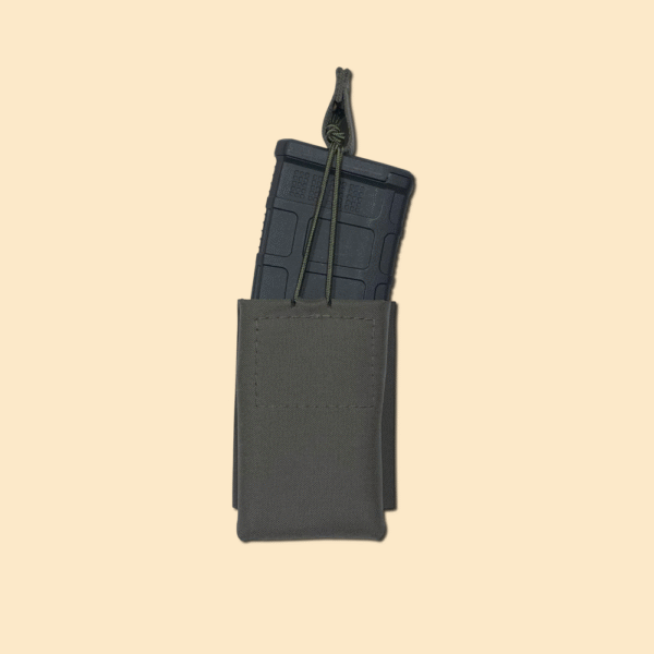 Our 5.56 magazine pouch loaded with a Pmag. Ranger Green. Uses Bungee Retention