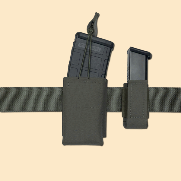 Our 5.56 mag pouch in Ranger Green loaded with Pmag, pictured on a riggers belt next to an elastic pistol mag pouch.