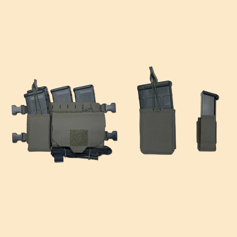 Our Quick Access Trauma pouch with a medkit and 5.56 mag pouch mounted on a chest rig placard, alongside our .308 magazine pouch and elastic pistol magazine pouch