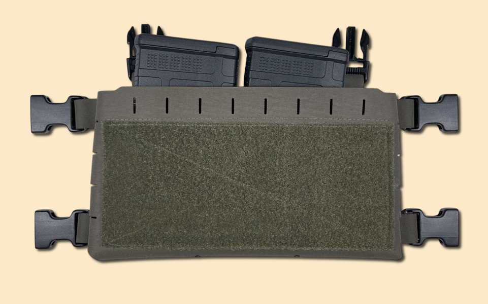 Chest rig placard in ranger green, displayed with two .308 magazines.