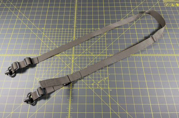 Our Slingus Light two point quick adjust rifle sling displayed with two Made in America QD Sling Swivels