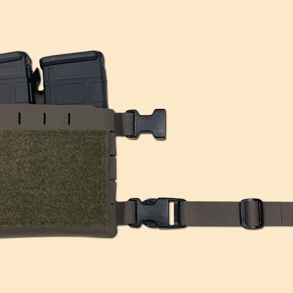 One end of our ranger green back strap displayed connected to the wait belt connection of our chest rig placard.