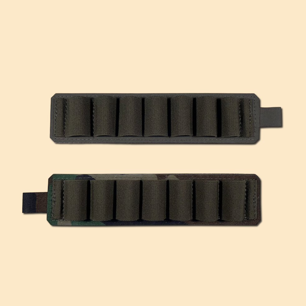 Two seven-shotshell holders, top shotshell holder in ranger green, bottom shotshell holder in M-81 woodland.